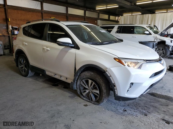 2017 Toyota RAV4 XLE with VIN JTMRFREV0HD212108, listed as a Copart auction lot 49278405 with 96,931 mi miles and Salvage Title. Bid and sale history available at carsss.com. Image 4.
