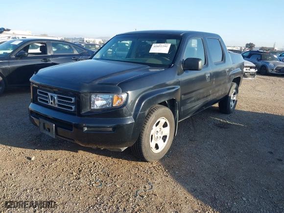 2006 Honda Ridgeline RT with VIN 2HJYK16296H551622, listed as a IAAI auction lot 41852291 with 266,964 mi miles. Bid and sale history available at carsss.com. Image 2.