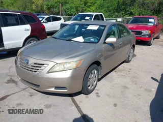 2009 Toyota Camry with VIN 4T1BE46K09U854188, listed as a IAAI auction lot 41973199 with 210,924 mi miles. Bid and sale history available at carsss.com. Image 2.