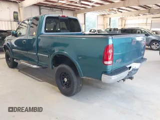 1998 Ford F-150 XL with VIN 1FTRX18L5WNB23716, listed as a IAAI auction lot 42579695 with 305,363 mi miles and . Bid and sale history available at DreamBid. Image 3.
