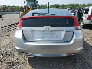 2010 Honda Insight EX with VIN JHMZE2H77AS015329, listed as a Copart auction lot 60502835 with 213,397 mi miles and Clean title. Bid and sale history available at DreamBid. Image 6.