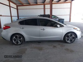 2016 Kia Forte EX with VIN KNAFX4A81G5528190, listed as a IAAI auction lot 42142075 with 162,056 mi miles. Bid and sale history available at carsss.com. Image 13.