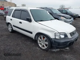 2000 Honda CR-V LX with VIN JHLRD2844YC010848, listed as a IAAI auction lot 41678830 with 173,137 mi miles. Bid and sale history available at carsss.com. Image 1.