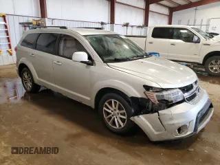2013 Dodge Journey SXT with VIN 3C4PDCBG3DT699762, listed as a Copart auction lot 53712395 with 145,360 mi miles and Salvage Title. Bid and sale history available at carsss.com. Image 4.