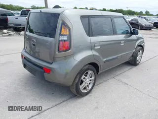 2010 Kia Soul + with VIN KNDJT2A20A7084899, listed as a IAAI auction lot 41990009 with 210,572 mi miles and . Bid and sale history available at DreamBid. Image 4.