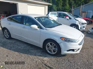 2018 Ford Fusion SE with VIN 3FA6P0HDXJR135927, listed as a IAAI auction lot 42645427 with 107,756 mi miles and . Bid and sale history available at DreamBid. Image 1.