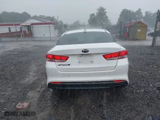2018 Kia Optima S with VIN 5XXGT4L36JG209780, listed as a IAAI auction lot 40008792 with 97,575 mi miles. Bid and sale history available at carsss.com. Image 17.