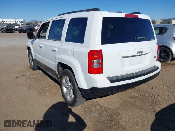 2011 Jeep Patriot Latitude with VIN 1J4NT1GB0BD105816, listed as a IAAI auction lot 41330180 with 143,431 mi miles. Bid and sale history available at carsss.com. Image 3.
