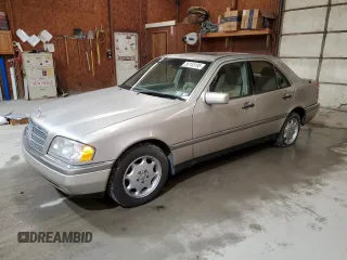 1995 Mercedes-Benz C with VIN WDBHA28E8SF115598, listed as a Copart auction lot 50145195 with 129,134 mi miles and Clean Title. Bid and sale history available at carsss.com. Image 1.