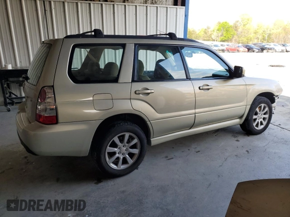 2007 Subaru Forester X w/Premium Pkg with VIN JF1SG656X7H724252, listed as a Copart auction lot 52099715 with 233,034 mi miles and Salvage Title. Bid and sale history available at carsss.com. Image 3.
