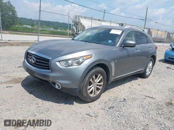 2014 Infiniti QX70 with VIN JN8CS1MW5EM411653, listed as a IAAI auction lot 42690935 with 110,806 mi miles and . Bid and sale history available at DreamBid. Image 2.