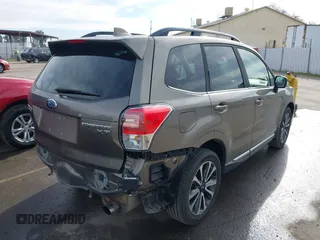 2017 Subaru Forester Touring with VIN JF2SJGWC8HH802262, listed as a IAAI auction lot 41681997 with 75,993 mi miles. Bid and sale history available at carsss.com. Image 4.