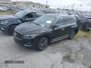 2020 Infiniti QX60 Pure with VIN 5N1DL0MN5LC525763, listed as a IAAI auction lot 41259100 with 38,995 mi miles and . Bid and sale history available at DreamBid. Image 18.