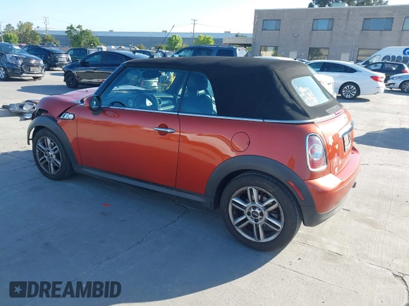 2012 MINI Convertible with VIN WMWZN3C54CT134124, listed as a IAAI auction lot 42313148 with 119,963 mi miles and . Bid and sale history available at DreamBid. Image 3.