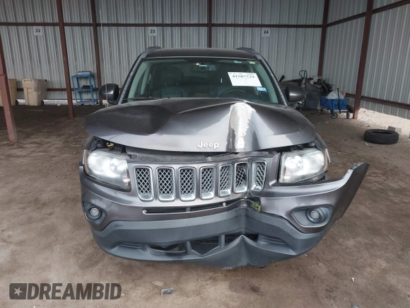 2016 Jeep Compass Latitude with VIN 1C4NJCEA2GD599833, listed as a IAAI auction lot 41507729 with 107,187 mi miles. Bid and sale history available at carsss.com. Image 13.