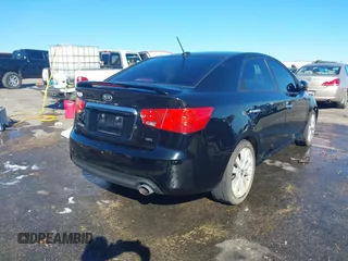 2012 Kia Forte SX with VIN KNAFW4A3XC5563571, listed as a IAAI auction lot 41590629 with 115,993 mi miles. Bid and sale history available at carsss.com. Image 4.