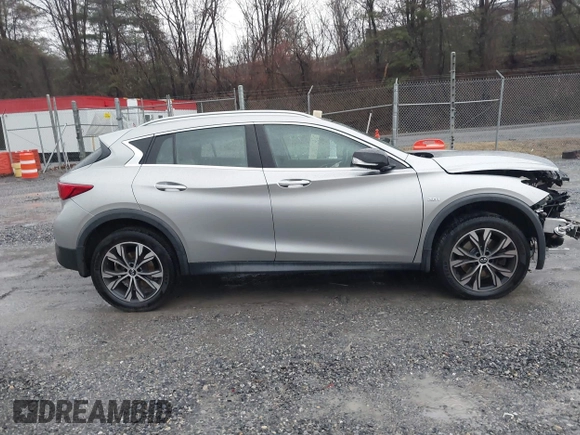 2018 Infiniti QX30 Luxury with VIN SJKCH5CR9JA058968, listed as a IAAI auction lot 41064768 with 64,687 mi miles and . Bid and sale history available at DreamBid. Image 13.