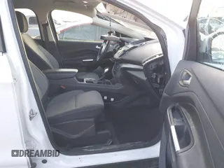 2018 Ford Escape SE z VIN 1FMCU9GD6JUC13023, wystawiony jako IAAI lot #41023197 z przebiegiem 105 489 mil mil oraz . Historia ofert i sprzedaży dostępna na DreamBid. Obrazek 5.