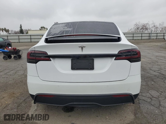 2023 Tesla Model X with VIN 7SAXCAE58PF379943, listed as a Copart auction lot 86352354 with Not Provided miles and Salvage Title. Bid and sale history available at DreamBid. Image 6.