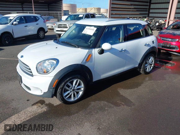 2013 MINI Countryman with VIN WMWZB3C52DWR35806, listed as a IAAI auction lot 42184010 with 93,380 mi miles and . Bid and sale history available at DreamBid. Image 2.