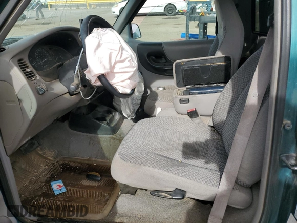 1998 Ford Ranger XL with VIN 1FTYR10C6WUC52233, listed as a Copart auction lot 56231925 with 198,687 mi miles and Salvage title. Bid and sale history available at DreamBid. Image 7.