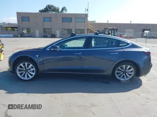 2018 Tesla Model 3 Long Range Battery with VIN 5YJ3E1EA4JF024102, listed as a IAAI auction lot 42100621 with 86,298 mi miles and . Bid and sale history available at DreamBid. Image 13.