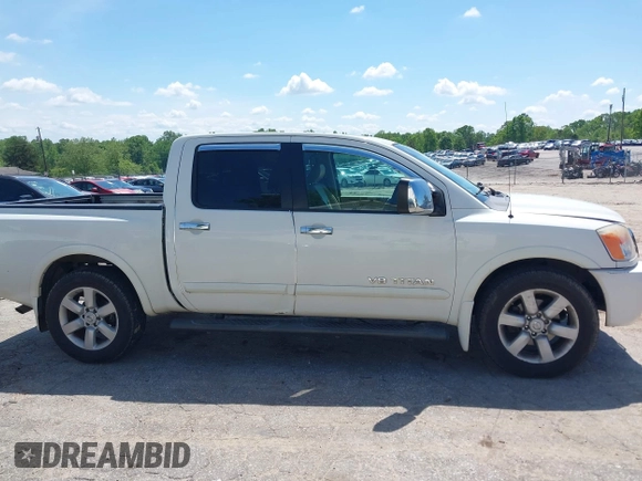 2010 Nissan Titan SE with VIN 1N6BA0ED4AN323907, listed as a IAAI auction lot 42113512 with 198,530 mi miles. Bid and sale history available at carsss.com. Image 14.