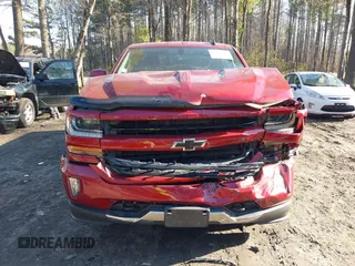 2018 Chevrolet Silverado 1500 LT with VIN 3GCUKREC4JG204672, listed as a IAAI auction lot 41638941 with 134,506 mi miles. Bid and sale history available at carsss.com. Image 6.