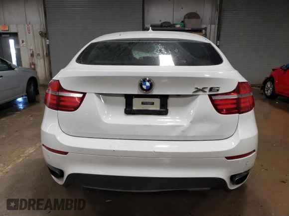 2013 BMW X6 xDrive50i z VIN 5UXFG8C53DL591536, wystawiony jako Copart lot #82219394 z przebiegiem 191 439 mil mil oraz Szkoda całkowita • Salvage title. Historia ofert i sprzedaży dostępna na DreamBid. Obrazek 6.