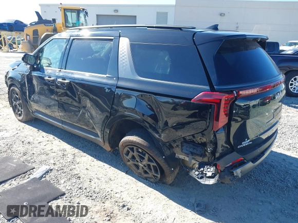 2025 Kia Carnival SX with VIN KNDNE5K35S6472142, listed as a IAAI auction lot 41280650 with 4,181 mi miles and . Bid and sale history available at DreamBid. Image 3.