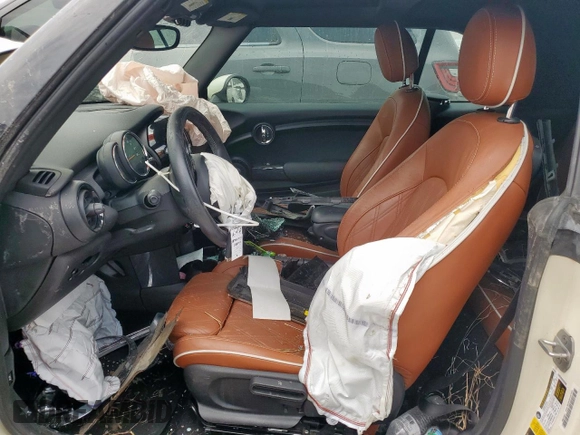 2017 MINI Convertible Cooper z VIN WMWWG5C32H3C20341, wystawiony jako Copart lot #57039685 z przebiegiem 100 575 mil mil oraz Szkoda całkowita • Salvage title. Historia ofert i sprzedaży dostępna na DreamBid. Obrazek 7.