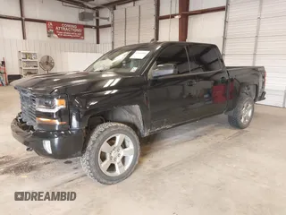2017 Chevrolet Silverado 1500 LT with VIN 3GCUKREC6HG501307, listed as a IAAI auction lot 41611899 with 133,863 mi miles and . Bid and sale history available at DreamBid. Image 23.