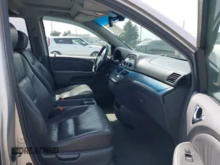 2006 Honda Odyssey EX-L z VIN 5FNRL38786B411187, wystawiony jako IAAI lot #42316075 z przebiegiem 272 658 mil mil oraz . Historia ofert i sprzedaży dostępna na DreamBid. Obrazek 5.