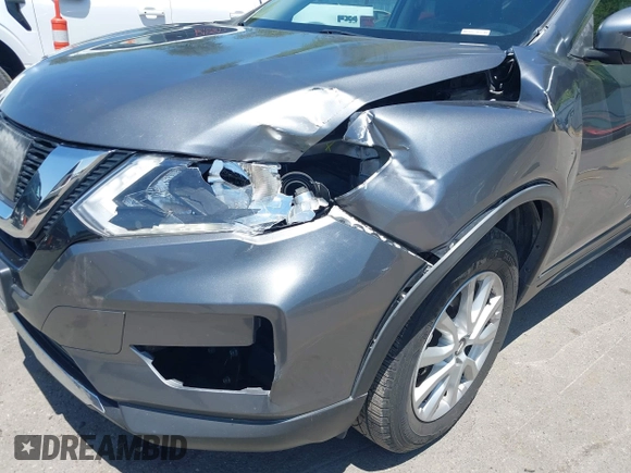 2017 Nissan Rogue S with VIN KNMAT2MV1HP584912, listed as a IAAI auction lot 42598687 with 81,439 mi miles and . Bid and sale history available at DreamBid. Image 6.
