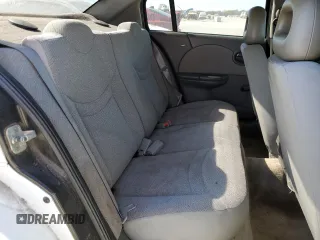2003 Saturn ION ION 1 z VIN 1G8AF52F83Z151812, wystawiony jako Copart lot #77000594 z przebiegiem 313 620 mil mil oraz Szkoda całkowita • Salvage title. Historia ofert i sprzedaży dostępna na DreamBid. Obrazek 10.