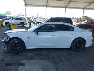 2023 Dodge Charger Scat Pack Widebody with VIN 2C3CDXGJ6PH635498, listed as a IAAI auction lot 41448100 with 13,678 mi miles and . Bid and sale history available at DreamBid. Image 15.