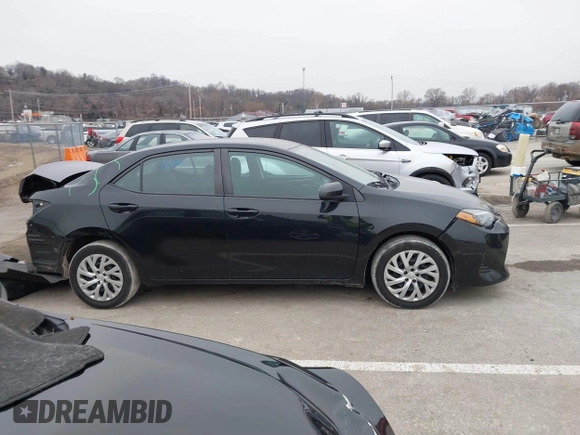 2019 Toyota Corolla L with VIN 5YFBURHE5KP945925, listed as a IAAI auction lot 41493079 with 96,849 mi miles and . Bid and sale history available at carsss.com. Image 14.