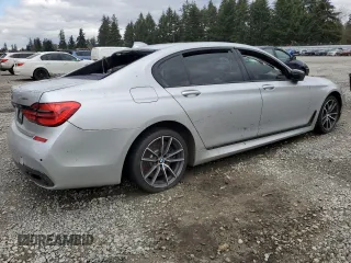2018 BMW 7 Series 740i with VIN WBA7E2C53JG742711, listed as a Copart auction lot 51643505 with 0 mi miles and Salvage Title. Bid and sale history available at carsss.com. Image 3.