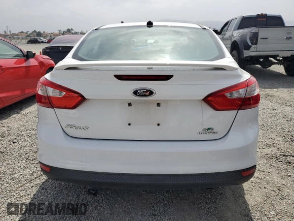 2013 Ford Focus SE z VIN 1FADP3F29DL374088, wystawiony jako Copart lot #59585135 z przebiegiem 74 997 mil mil oraz Szkoda całkowita • Salvage title. Historia ofert i sprzedaży dostępna na DreamBid. Obrazek 6.