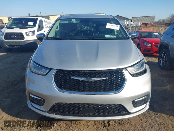 2023 Chrysler Pacifica Hybrid Limited with VIN 2C4RC1S72PR588627, listed as a IAAI auction lot 42063631 with 52,799 mi miles and . Bid and sale history available at DreamBid. Image 13.