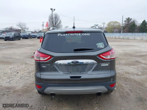 2015 Ford Escape Titanium with VIN 1FMCU0JX8FUC33649, listed as a IAAI auction lot 41992427 with 128,757 mi miles. Bid and sale history available at carsss.com. Image 15.