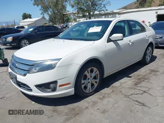 2012 Ford Fusion SE z VIN 3FAHP0HG1CR439198, wystawiony jako IAAI lot #42272610 z przebiegiem 151 249 mil mil oraz . Historia ofert i sprzedaży dostępna na DreamBid. Obrazek 2.