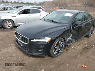 2019 Volvo S60 R-Design with VIN 7JRA22TM9KG014922, listed as a IAAI auction lot 41826883 with 97,702 mi miles. Bid and sale history available at carsss.com. Image 2.