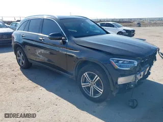 2021 Mercedes-Benz GLC with VIN W1N0G8DB7MV265036, listed as a IAAI auction lot 41232334 with 55,638 mi miles. Bid and sale history available at carsss.com. Image 1.
