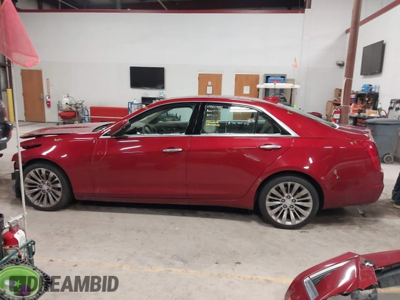 2016 Cadillac CTS Luxury Collection AWD z VIN 1G6AX5SX6G0124584, wystawiony jako IAAI lot #41235515 z przebiegiem 82 286 mil mil oraz . Historia ofert i sprzedaży dostępna na DreamBid. Obrazek 15.
