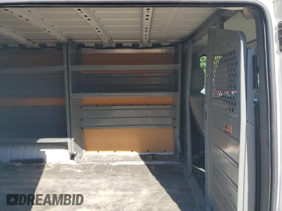 2018 Nissan NV Cargo S z VIN 1N6BF0KM4JN809929, wystawiony jako Copart lot #70578344 z przebiegiem 141 309 mil mil oraz Szkoda całkowita • Salvage title. Historia ofert i sprzedaży dostępna na DreamBid. Obrazek 11.
