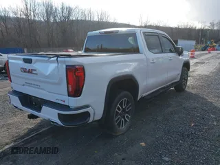 2021 GMC Sierra 1500 AT4 with VIN 3GTP9EEL1MG405564, listed as a IAAI auction lot 41214073 with 49,114 mi miles. Bid and sale history available at carsss.com. Image 4.