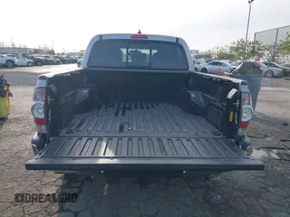 2014 Toyota Tacoma PreRunner with VIN 3TMJU4GN0EM163253, listed as a IAAI auction lot 41559780 with 155,883 mi miles. Bid and sale history available at carsss.com. Image 16.