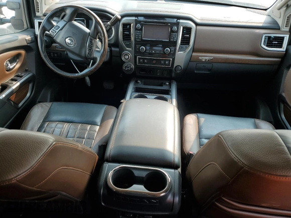 2016 Nissan Titan Platinum Reserve with VIN 1N6BA1F40GN515712, listed as a Copart auction lot 56931745 with 71,096 mi miles and Non repairable. Bid and sale history available at DreamBid. Image 8.