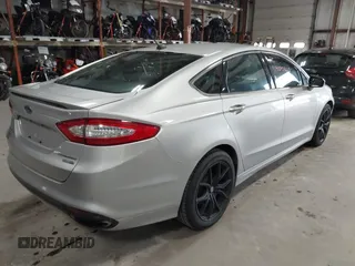 2015 Ford Fusion Titanium with VIN 3FA6P0D90FR201393, listed as a IAAI auction lot 40975015 with 131,641 mi miles. Bid and sale history available at carsss.com. Image 4.